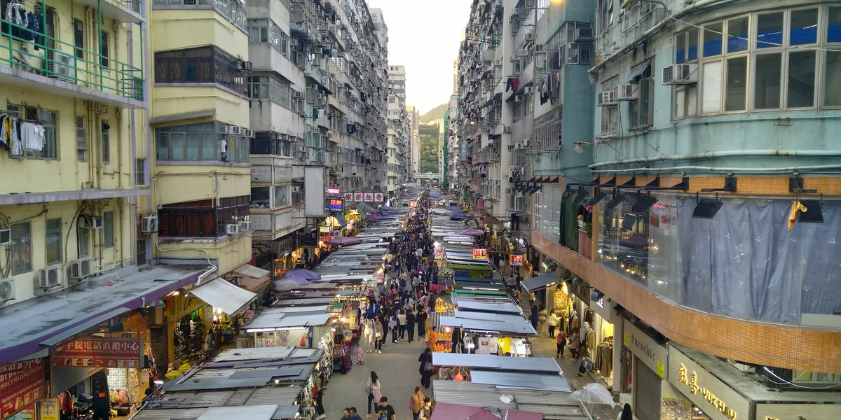 Covered market stalls packed along Fa Yuen Street in Mong Kok